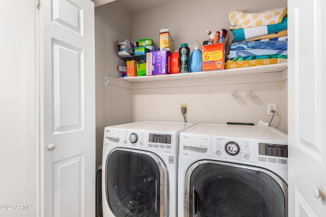 washroom featuring independent washer and dryer