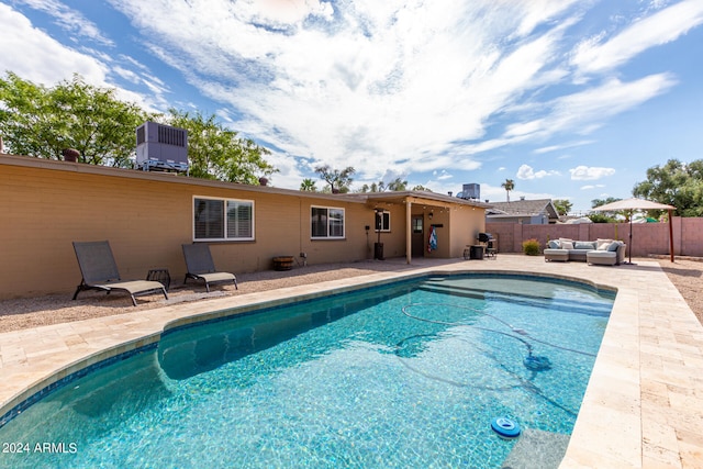 view of swimming pool featuring a patio