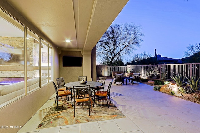 view of patio / terrace featuring a fenced backyard and outdoor dining area