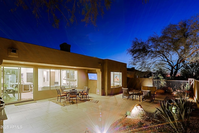 view of patio / terrace featuring outdoor dining space and fence