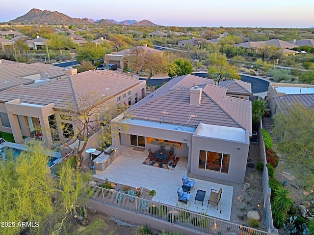 drone / aerial view featuring a mountain view