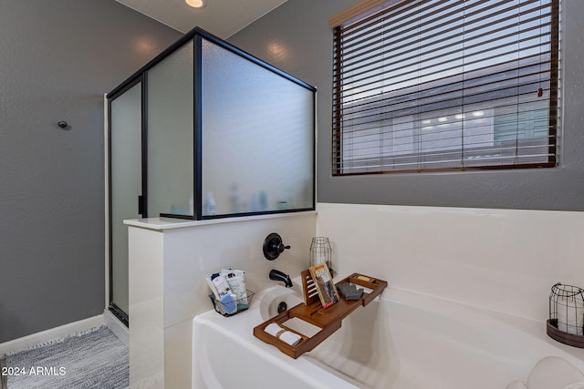 bathroom with a tub