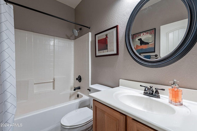 full bathroom featuring shower / bath combo, vanity, and toilet