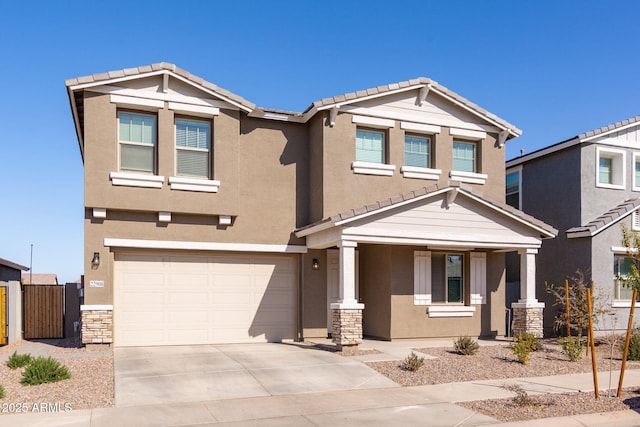 craftsman-style home featuring a garage and covered porch