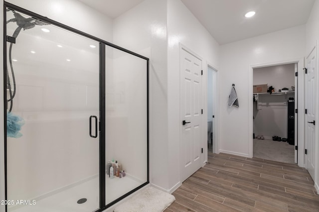 bathroom featuring toilet and walk in shower