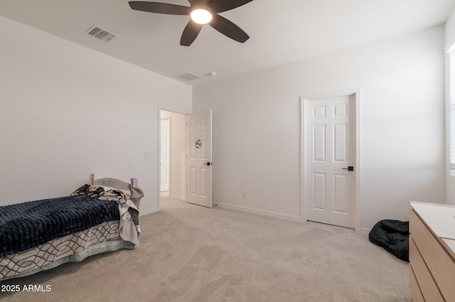 bedroom with ceiling fan and light colored carpet