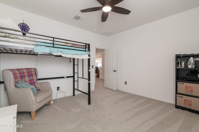 carpeted bedroom featuring ceiling fan