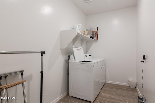 laundry area with separate washer and dryer