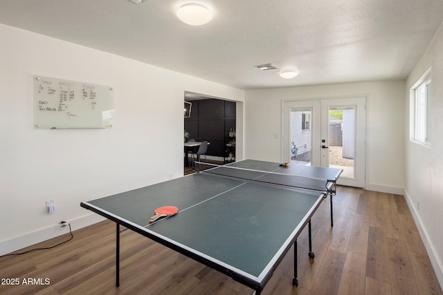 8022 E Columbus Ave, Scottsdale, AZ 85251 - game room with french doors and wood finished floors