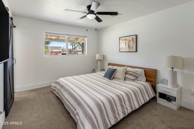 8022 E Columbus Ave, Scottsdale, AZ 85251 - bedroom featuring light carpet and a ceiling fan