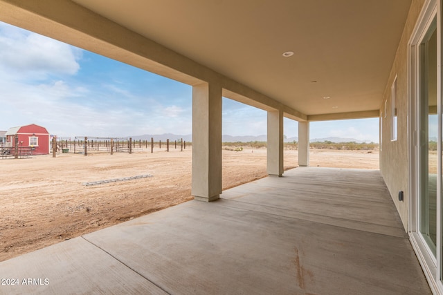 view of patio with a rural view