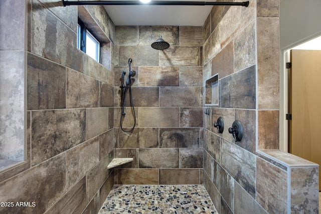 room details featuring tiled shower