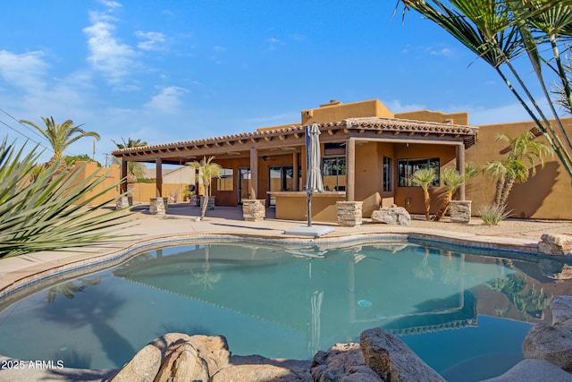 view of pool featuring an outdoor living space and a patio area