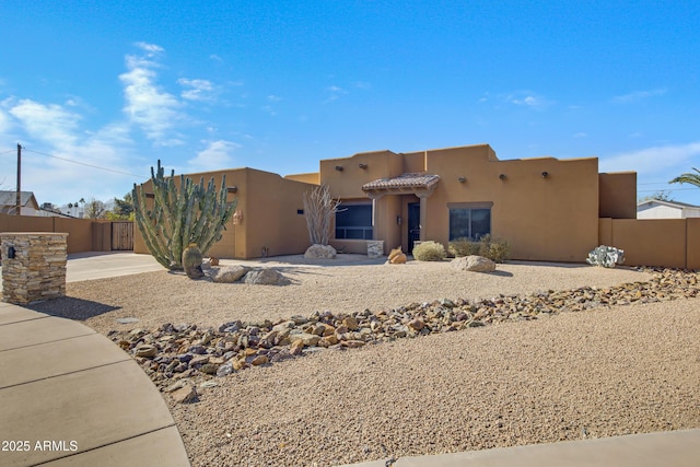 view of adobe home