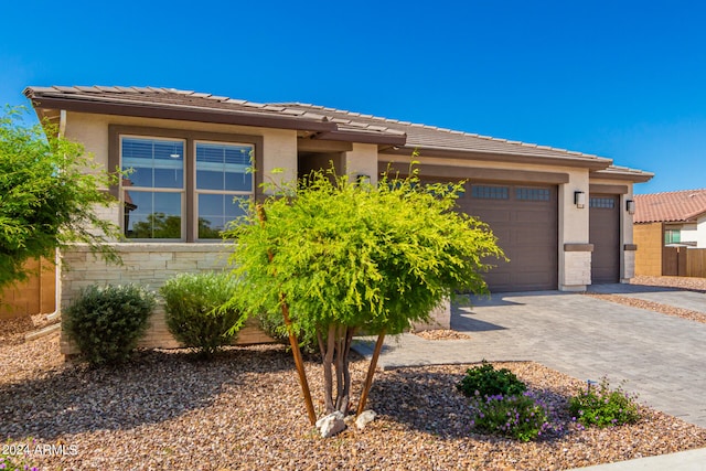 prairie-style house with a garage