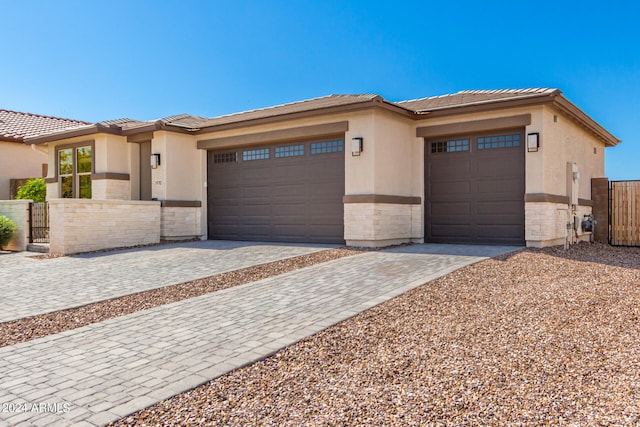 prairie-style home with a garage