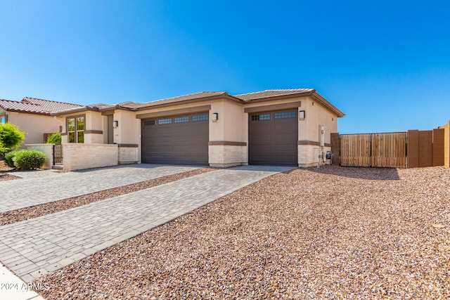 view of front of property with a garage