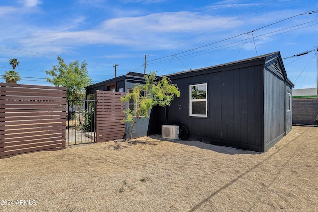 view of property exterior featuring ac unit