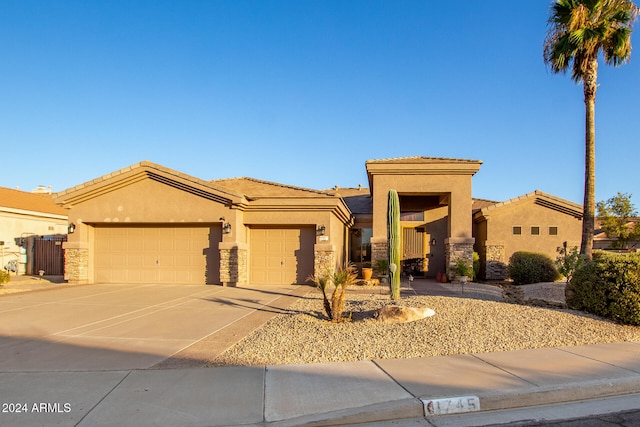 view of front of property with a garage