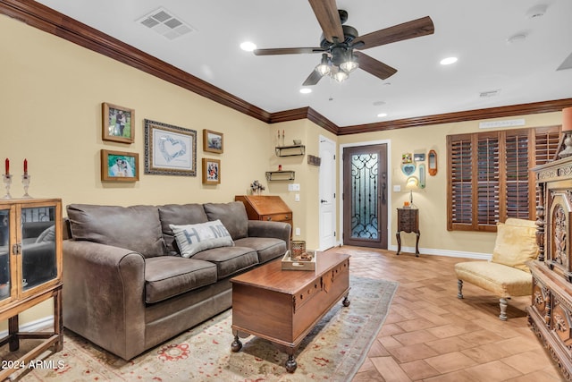 living room featuring ceiling fan and ornamental molding