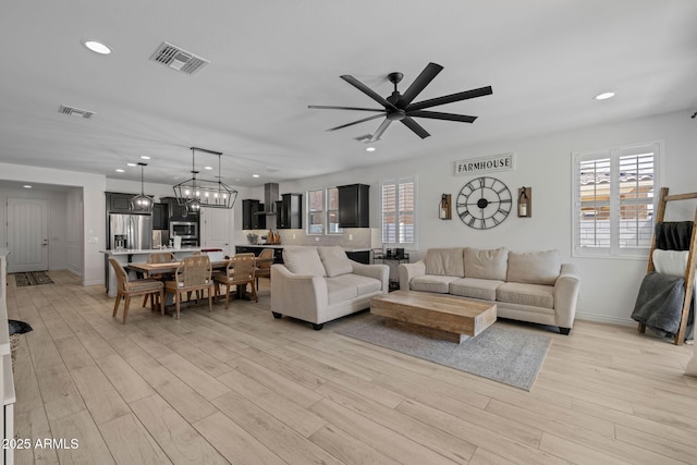 4346 S Synapse Dr, Mesa, AZ 85212 - living room featuring light wood-style flooring, recessed lighting, and ceiling fan