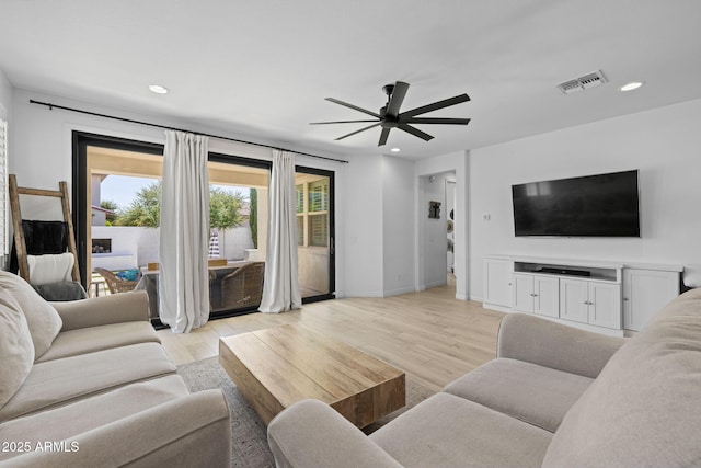 4346 S Synapse Dr, Mesa, AZ 85212 - living area with ceiling fan, recessed lighting, and light wood-style flooring