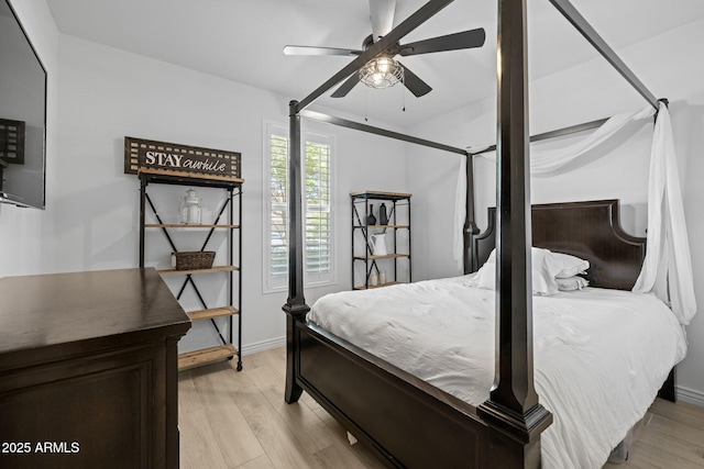 4346 S Synapse Dr, Mesa, AZ 85212 - bedroom with light wood-type flooring and a ceiling fan