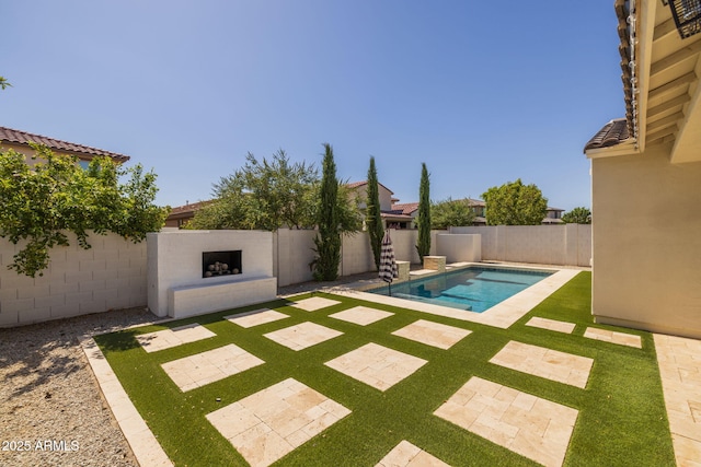 4346 S Synapse Dr, Mesa, AZ 85212 - view of swimming pool featuring an outdoor fireplace, a fenced backyard, and a patio area