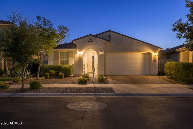 4346 S Synapse Dr, Mesa, AZ 85212 - mediterranean / spanish home with stucco siding, driveway, an attached garage, and a tiled roof