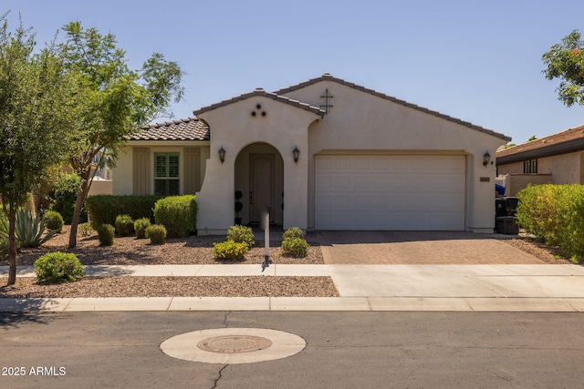 4346 S Synapse Dr, Mesa, AZ 85212 - mediterranean / spanish house with decorative driveway, a tiled roof, stucco siding, and a garage