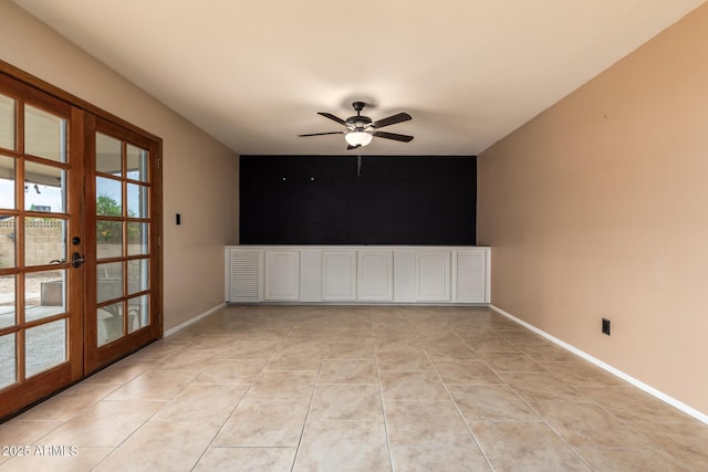 3010 E Cortez St, Phoenix, AZ 85028 - empty room with ceiling fan, baseboards, an accent wall, and light tile patterned floors