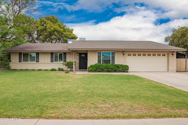 3010 E Cortez St, Phoenix, AZ 85028 - ranch-style house with a garage, driveway, brick siding, and roof with shingles