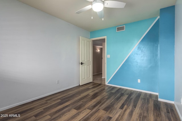 3010 E Cortez St, Phoenix, AZ 85028 - empty room with a ceiling fan, wood finished floors, and baseboards