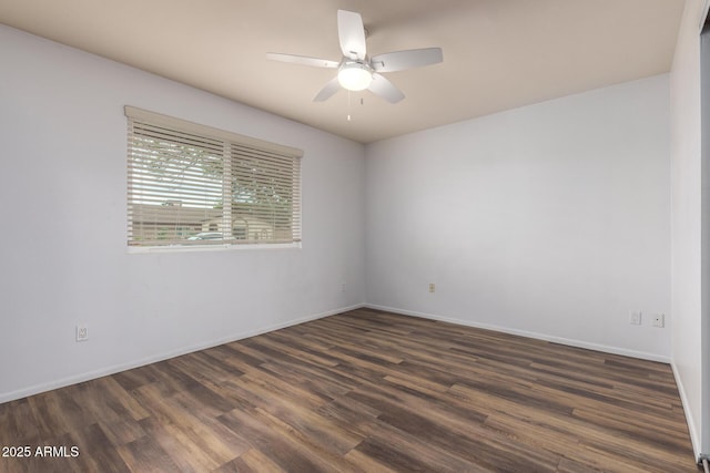 3010 E Cortez St, Phoenix, AZ 85028 - empty room with dark wood-style floors, ceiling fan, and baseboards