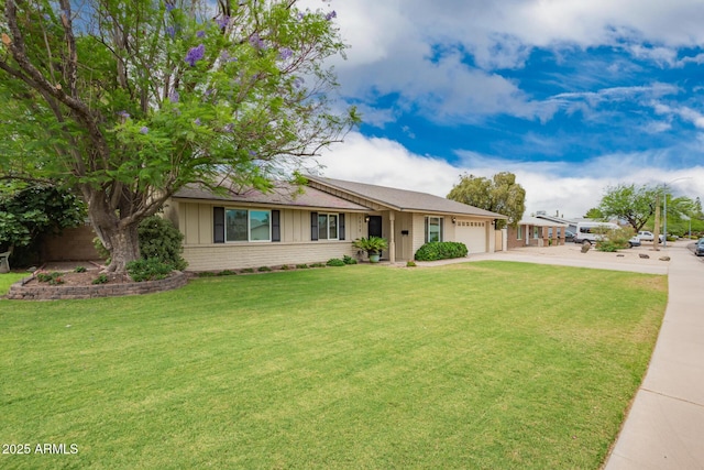 3010 E Cortez St, Phoenix, AZ 85028 - ranch-style home featuring an attached garage, driveway, board and batten siding, brick siding, and a front yard