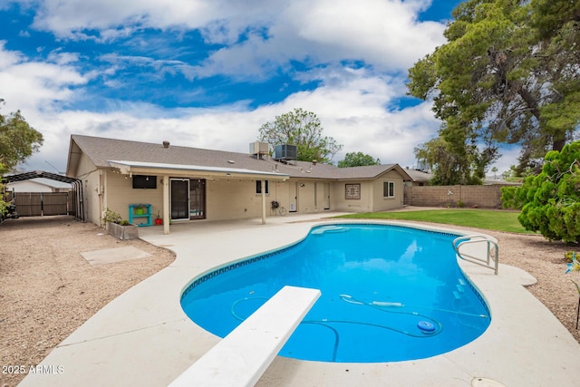 3010 E Cortez St, Phoenix, AZ 85028 - view of swimming pool featuring a patio, a diving board, a fenced backyard, and cooling unit