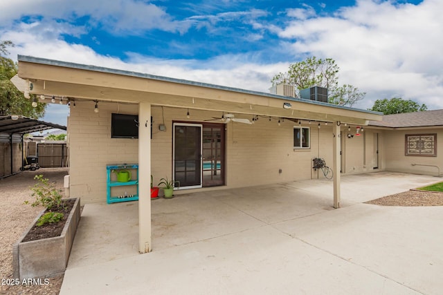 3010 E Cortez St, Phoenix, AZ 85028 - rear view of house featuring a patio area, concrete block siding, and a carport