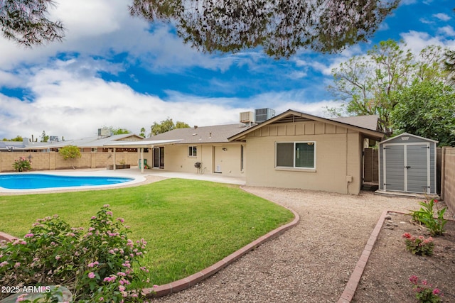 3010 E Cortez St, Phoenix, AZ 85028 - back of house with a patio area, cooling unit, board and batten siding, and roof with shingles