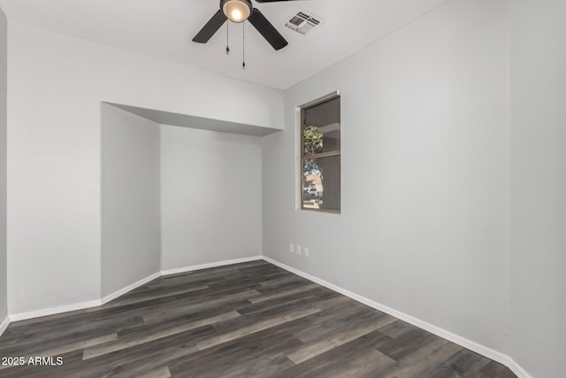 20919 E Desert Hills Blvd, Queen Creek, AZ 85142 - spare room featuring a ceiling fan and dark wood-type flooring
