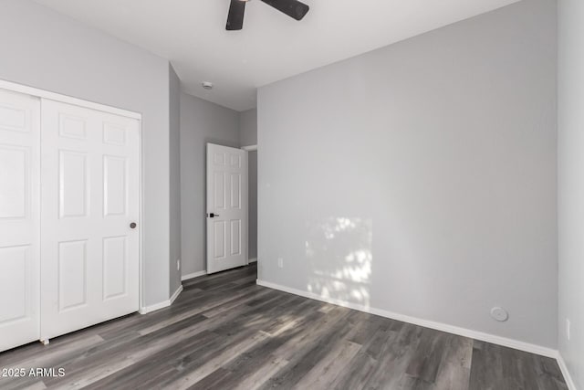 20919 E Desert Hills Blvd, Queen Creek, AZ 85142 - unfurnished bedroom with wood finished floors, a closet, and ceiling fan