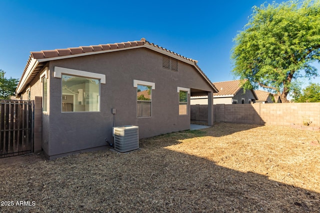 20919 E Desert Hills Blvd, Queen Creek, AZ 85142 - rear view of property featuring stucco siding, a fenced backyard, and a tile roof