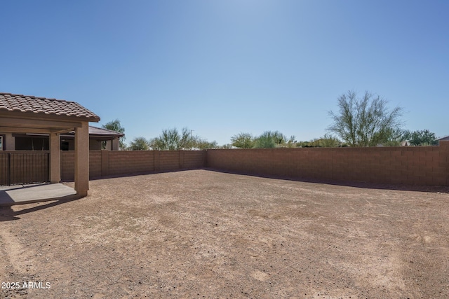 view of yard featuring fence