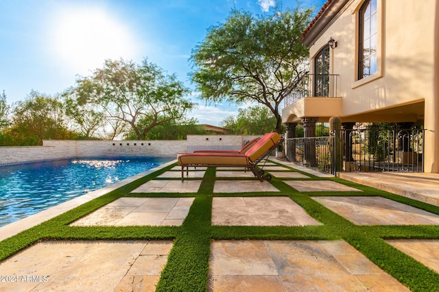 pool featuring a patio