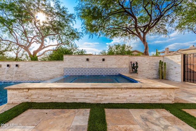 view of pool with a patio