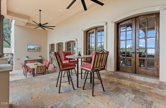 view of patio with ceiling fan and french doors