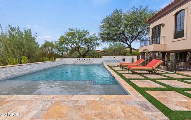 view of pool with a patio