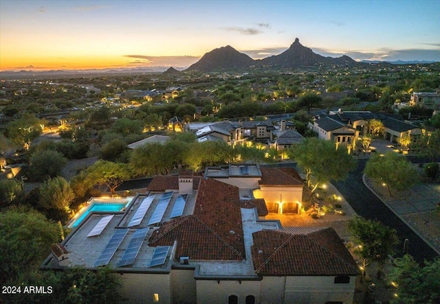 aerial view at dusk with a mountain view