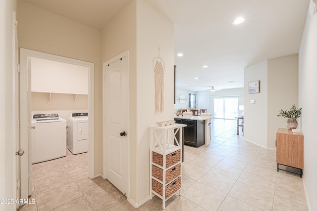 36467 W Pampoloma Ave, Maricopa, AZ 85138 - hall featuring independent washer and dryer, light tile patterned flooring, recessed lighting, and baseboards