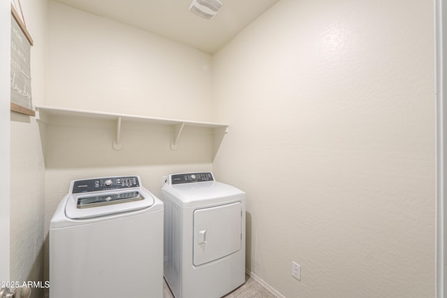 36467 W Pampoloma Ave, Maricopa, AZ 85138 - laundry area featuring separate washer and dryer and baseboards
