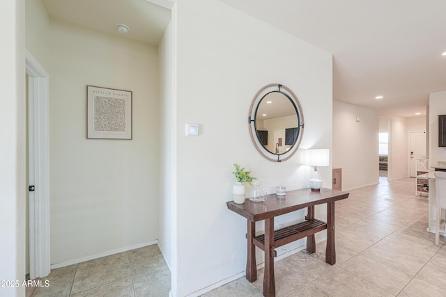 36467 W Pampoloma Ave, Maricopa, AZ 85138 - hall featuring recessed lighting, light tile patterned flooring, and baseboards